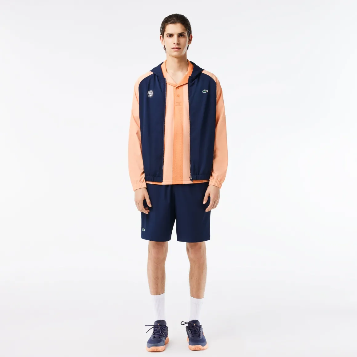 polo_ramasseur_unisexe_lacoste_x_rolandgarros__orange_2.webp Roland-Garros Tenues De Ramasseurs De Balles | Polos & Chemises-Polo Ramasseur unisexe Lacoste x - Orange