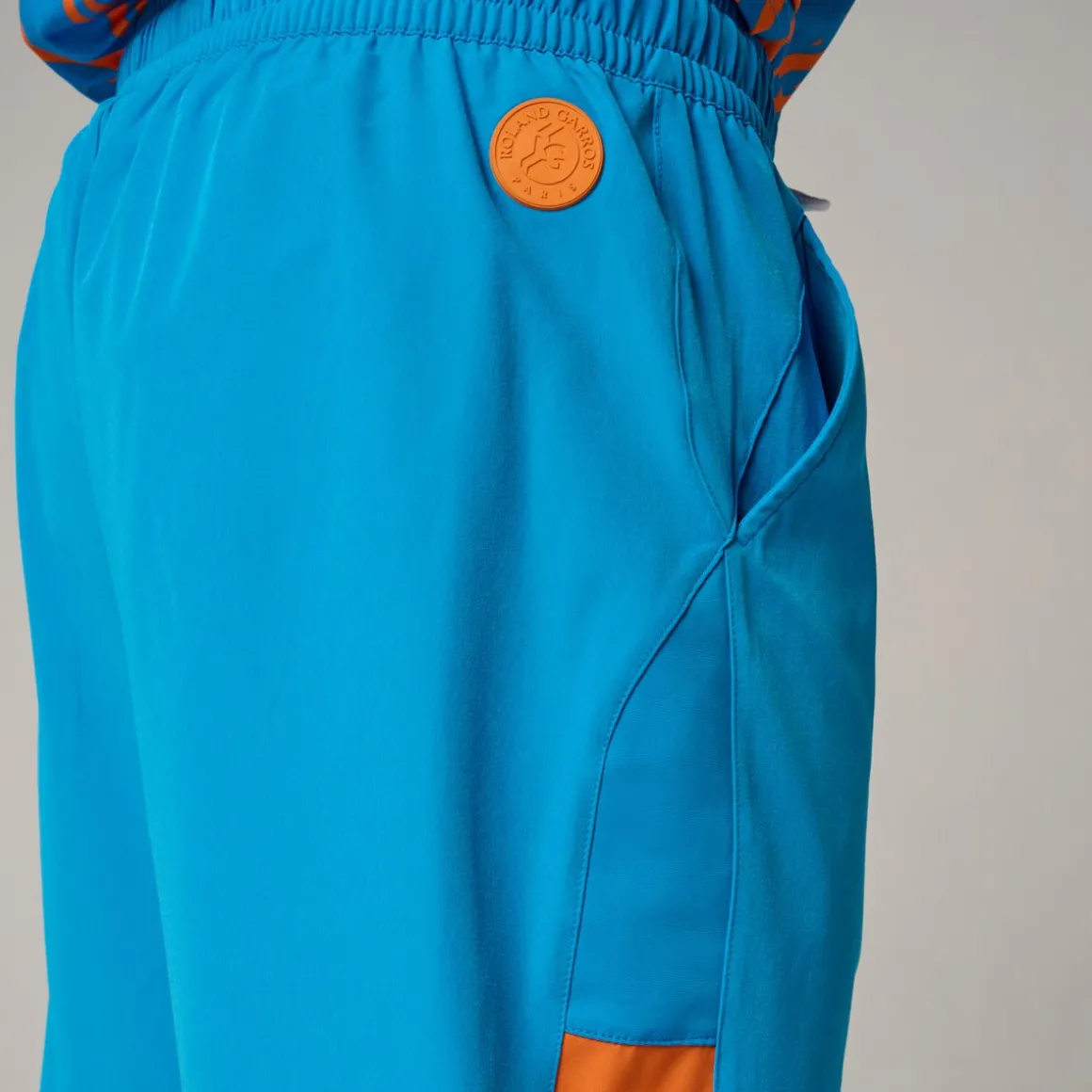 Roland-Garros Pantalons & Shorts-Short Pop Energy homme - Bleu et Terre Battue